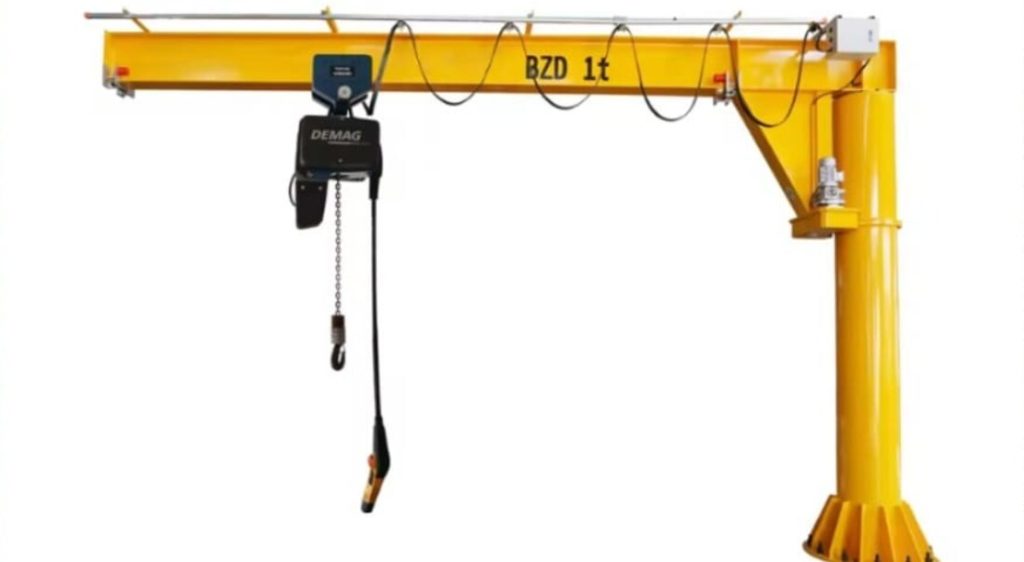 Pillar mounted jib crane slewing over a workstation